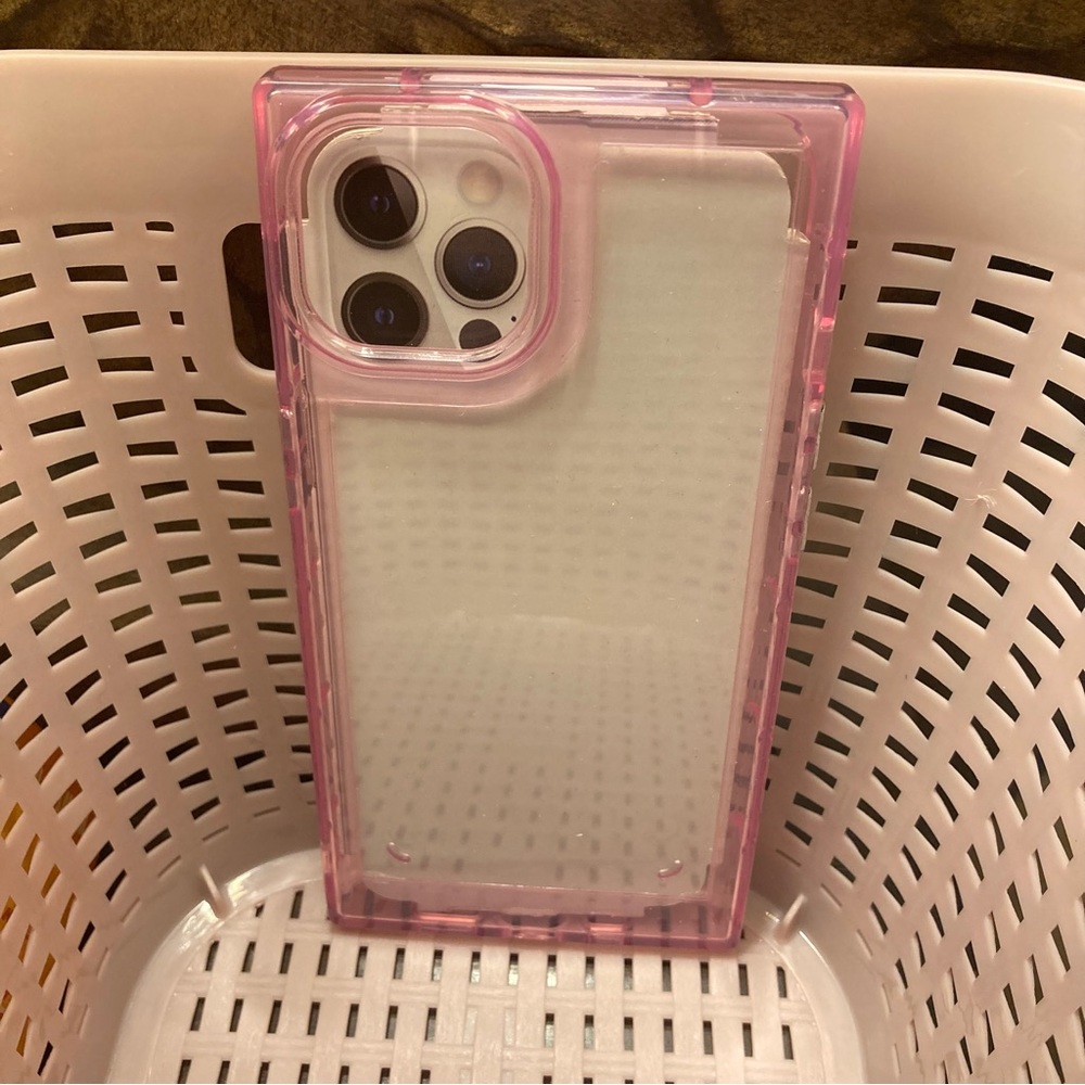 Translucent pink case. NEW Condition.